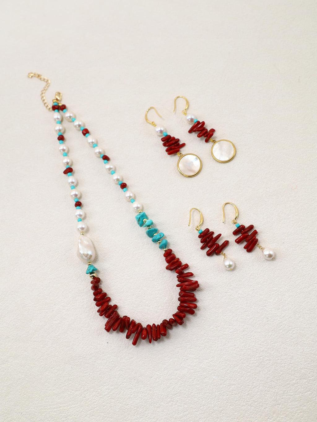 Elopement Necklace displayed with Scarlet Orbit and Scarlet Tide Earrings