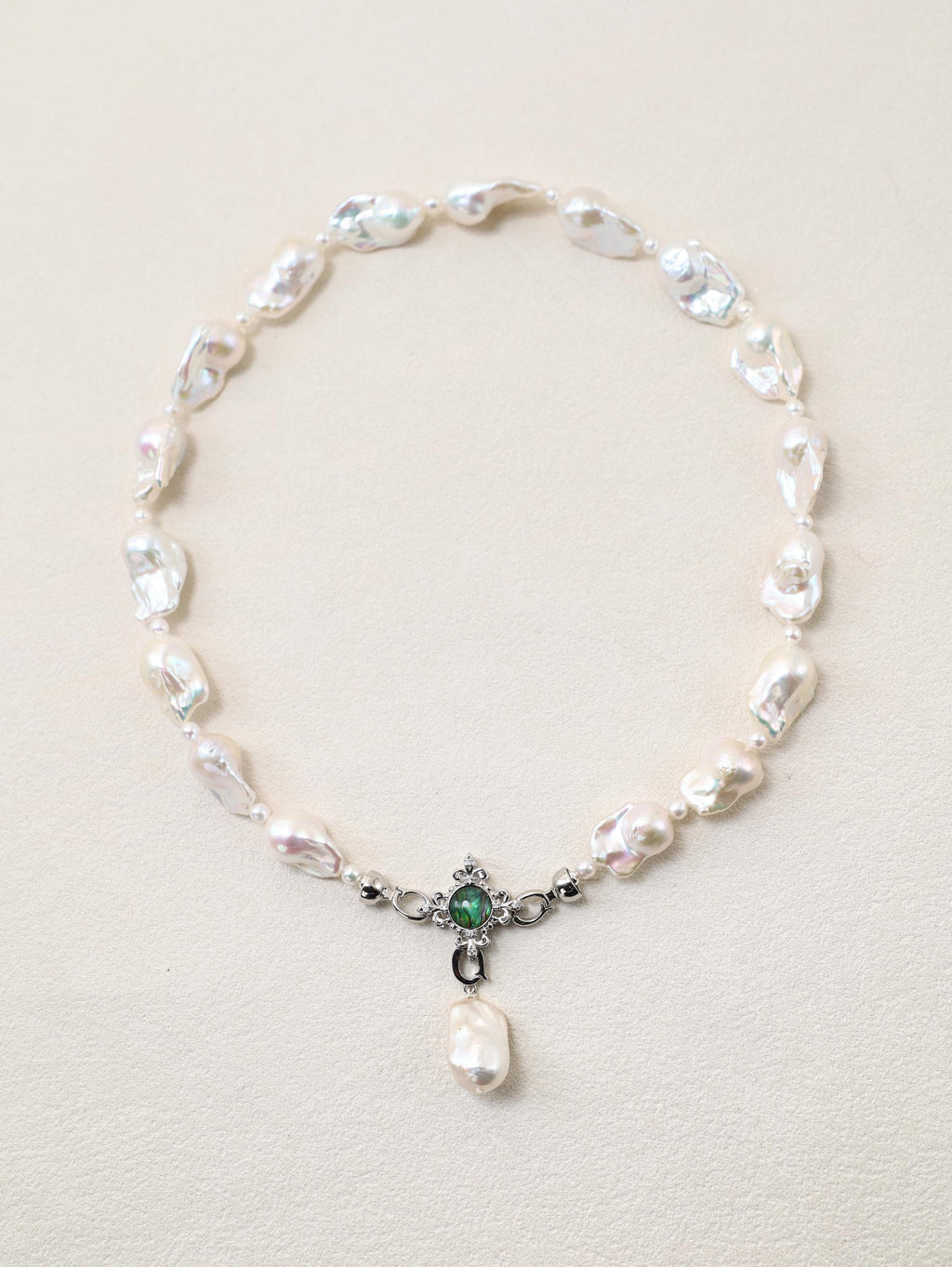 Siren’s Tail Necklace with baroque pearls and silver-toned pendant detail