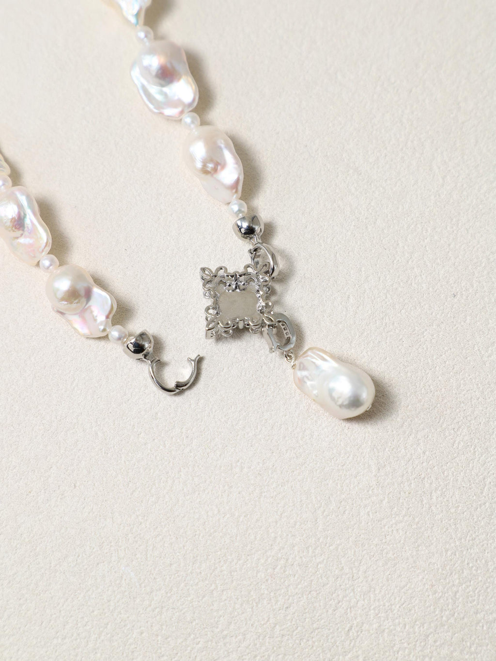 Siren’s Tail Necklace with baroque pearls and silver-toned pendant detail