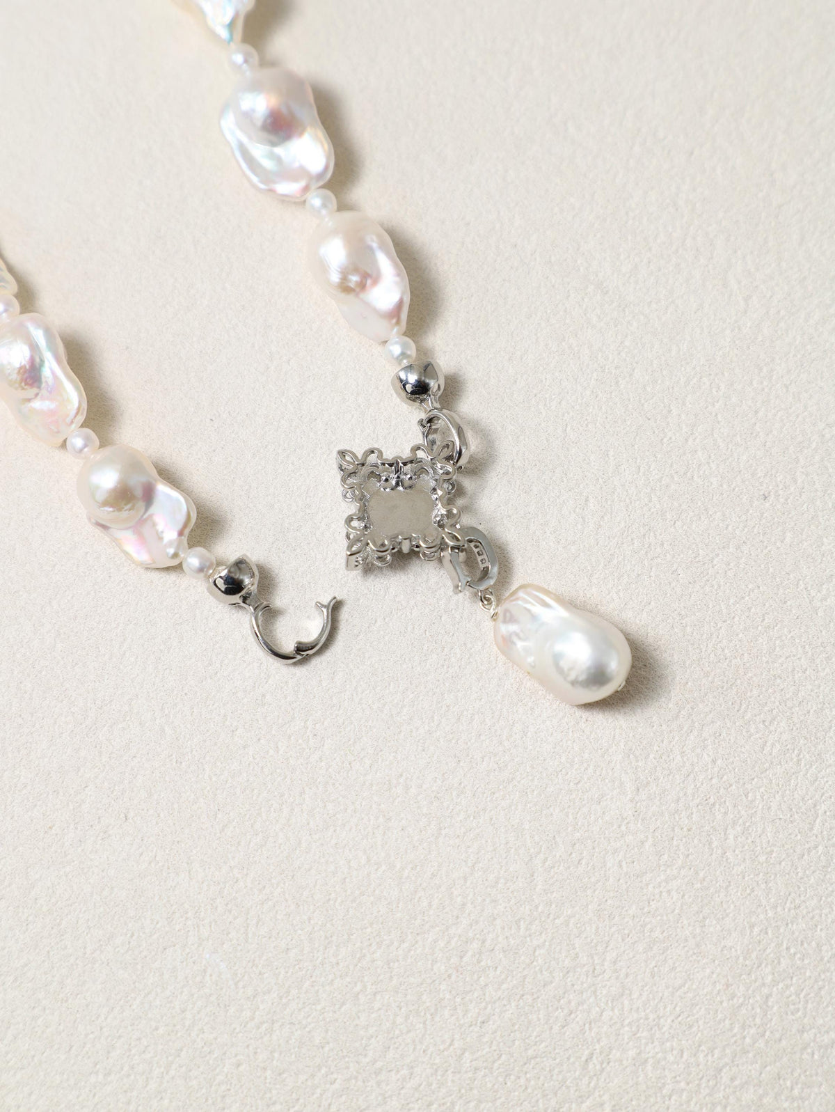 Siren’s Tail Necklace with baroque pearls and silver-toned pendant detail