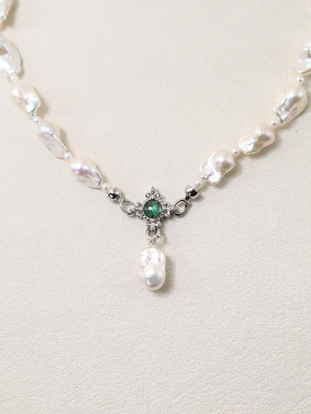 Siren’s Tail Necklace with baroque pearls and silver-toned pendant detail